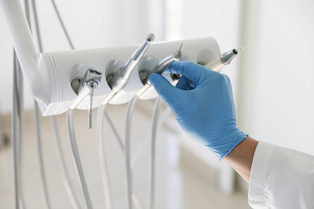 Professional Tooth Extraction technician working in Crown Point, IN